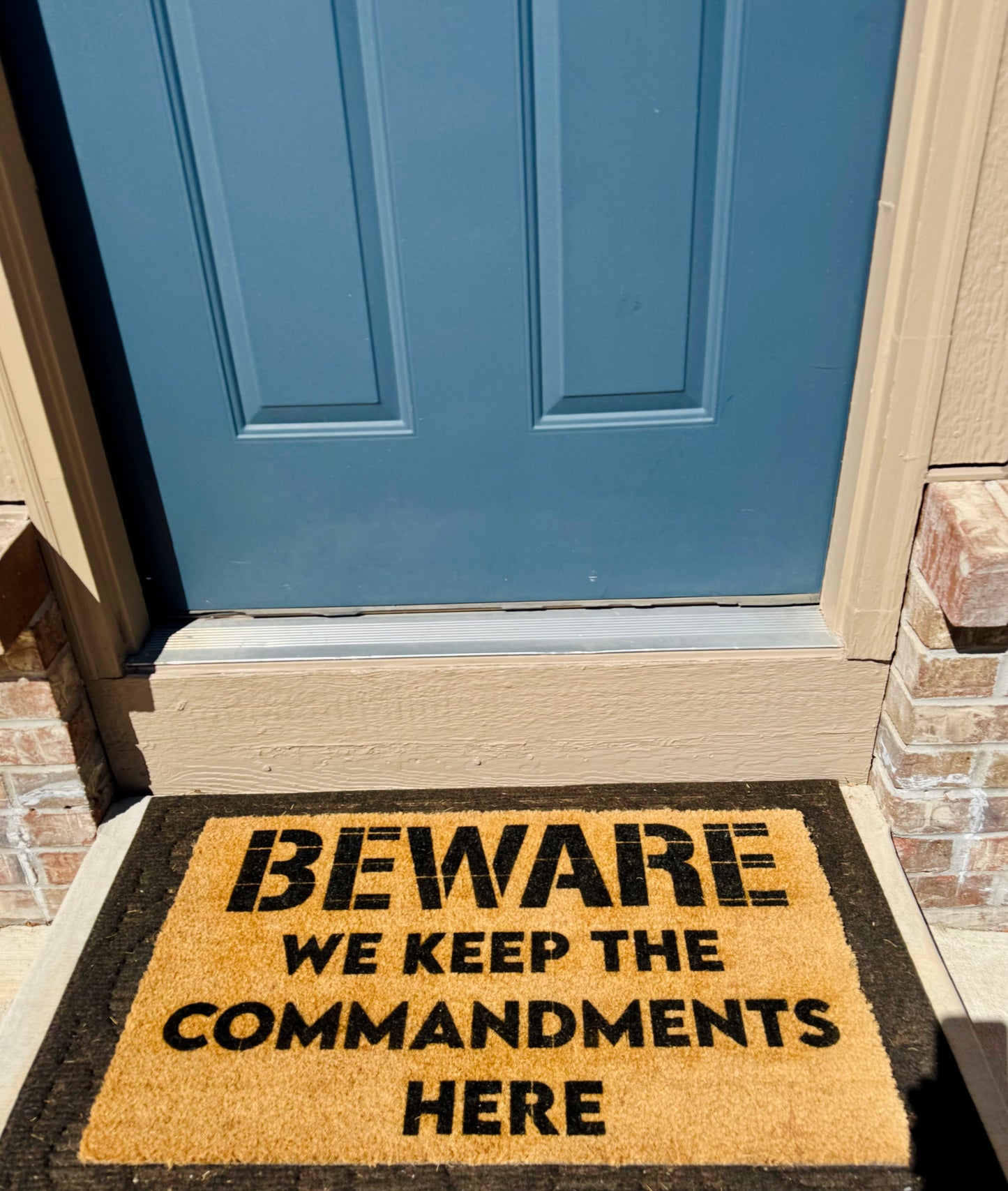 BEWARE | WE KEEP THE COMMANDMENTS HERE 18x30 Doormat